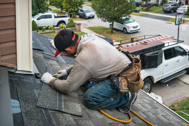 Professional Roofing technician working in White Hall, MD